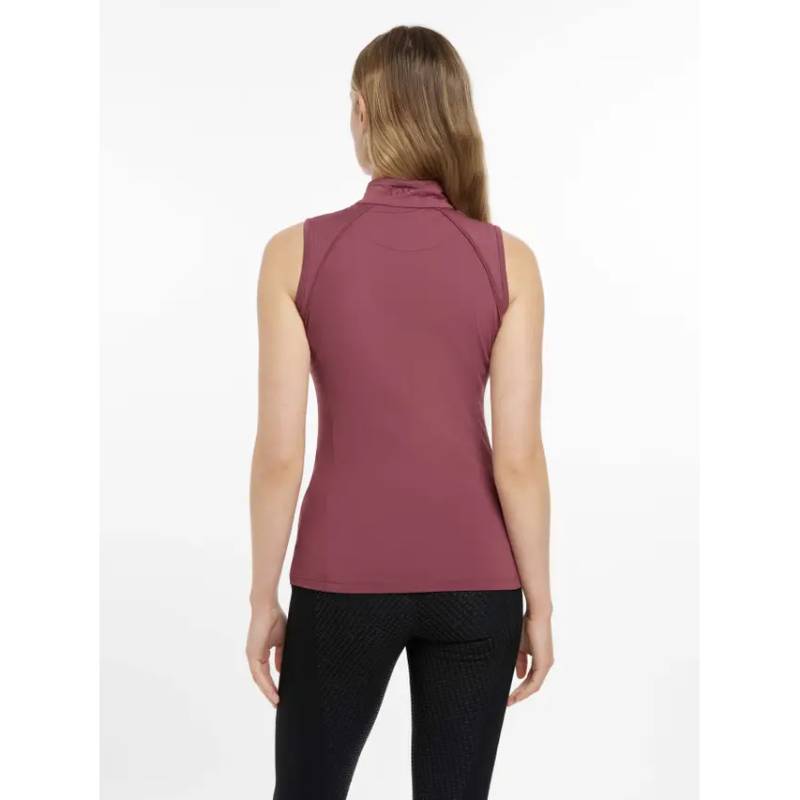 Woman in a LeMieux Maria Mesh Sleeveless Baselayer Rosewood, shown from the back.