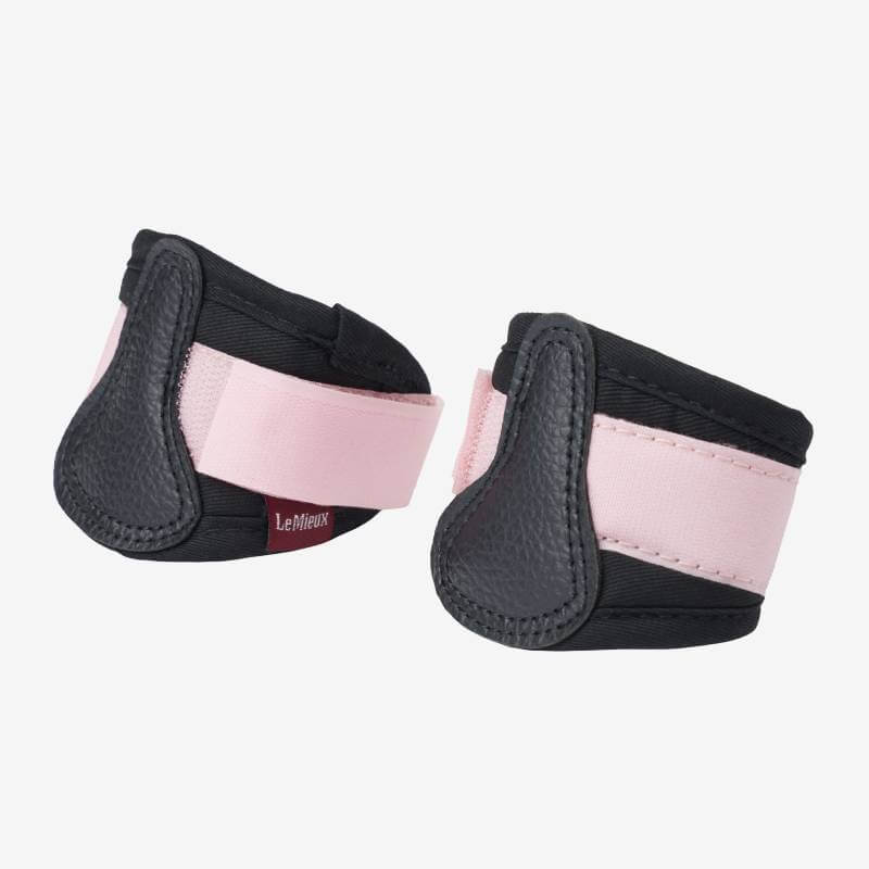 LeMieux Toy Pony Grafter Boots Blossom: pink protective boots with Velcro straps.