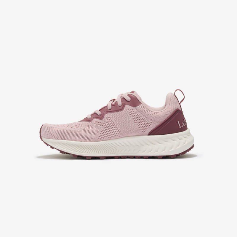 LeMieux Youth Trax-Lite Trainer Blossom, pink/maroon slip-on with white Michelin sole, side view.