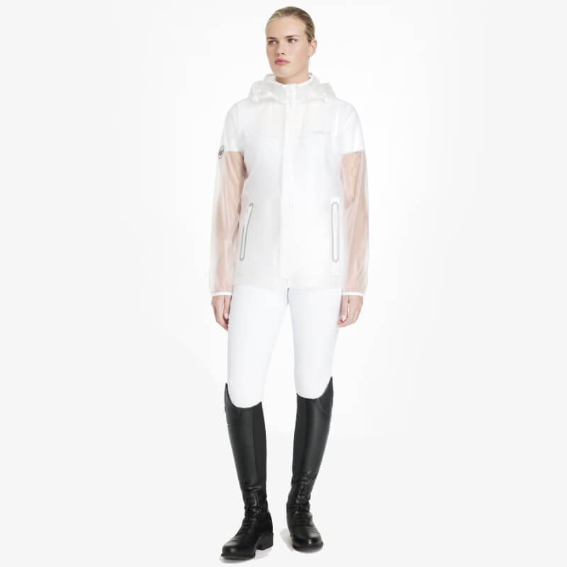 Model wears the LeMieux Competition Waterproof Jacket Clear by LeMieux against a white background.