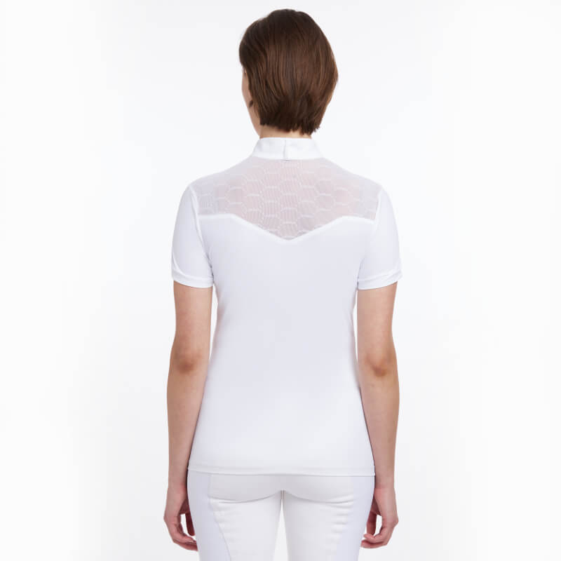 Woman in a LeMieux Emily SS Show Shirt White with lace detail on the back, facing away.