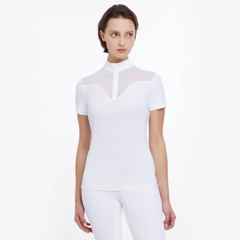 Woman wearing the LeMieux Emily SS Show Shirt in white, standing against a white background.