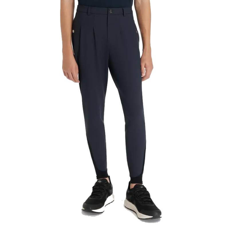 Person in LeMieux Young Rider Boys Classique Breech Navy, standing against a white background.