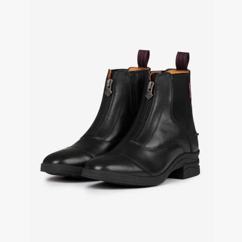 LeMieux Junior Zip Paddock Boot Black: leather ankle boots with front zippers and pull tabs.