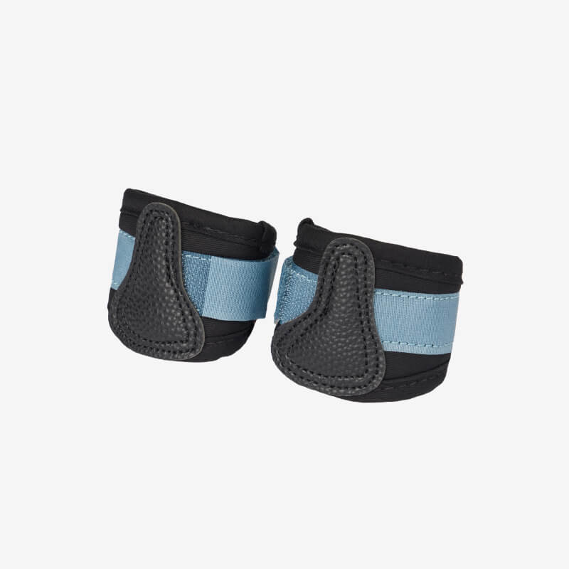 Ice blue LeMieux Toy Pony Grafter Boots with Velcro, similar to wrist support straps.