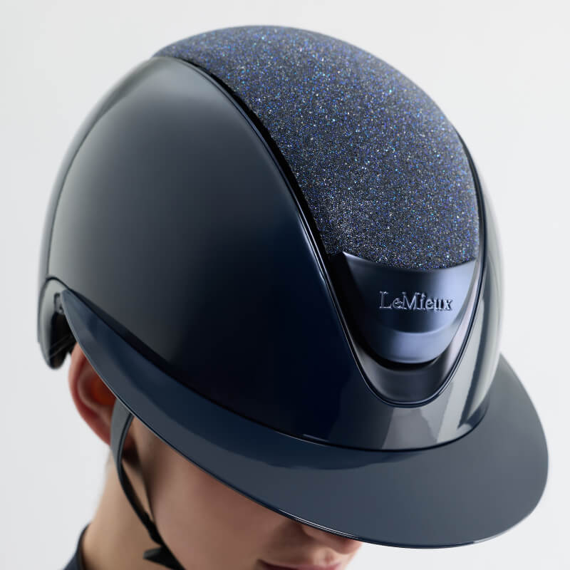 LeMieux Verv® helmet in black with Brilliance Navy magnetic top panel and LeMieux branding.