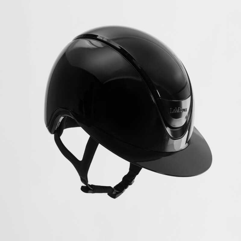LeMieux Verv® Competition Helmet in gloss black with adjustable chin strap on white background.