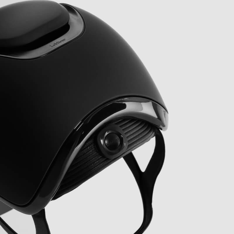 LeMieux Verv® Matte Black helmet: rear camera, impact protection, adjustable straps.