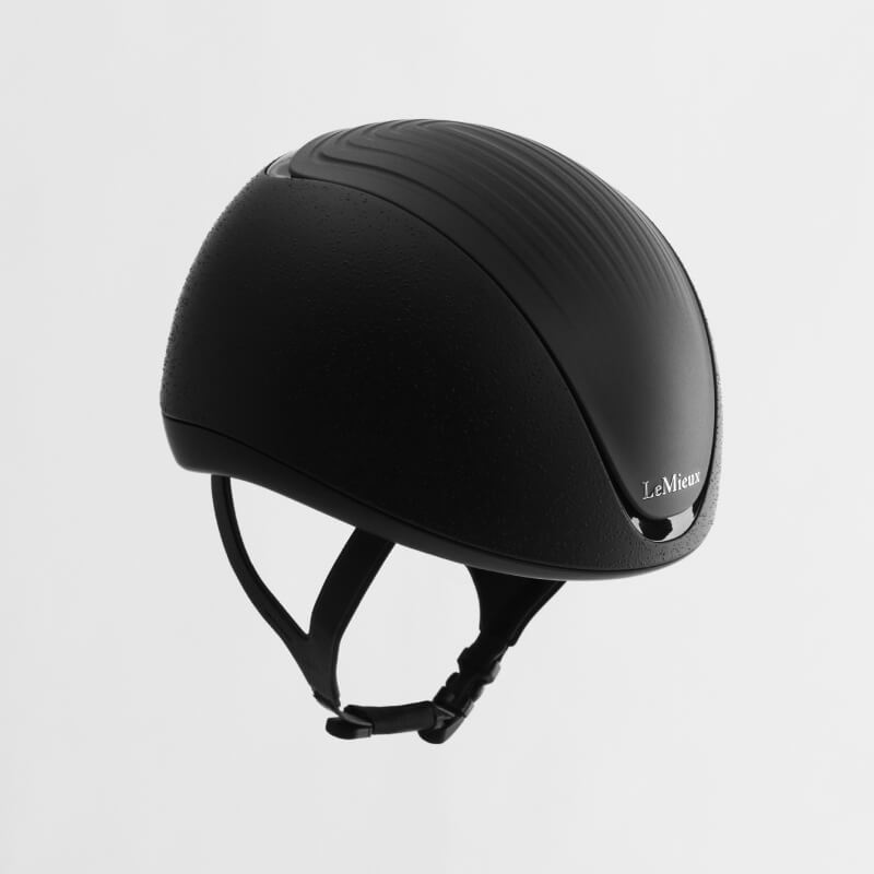 LeMieux Vexa® Skull Helmet Black with chin strap, shown against a plain white background.
