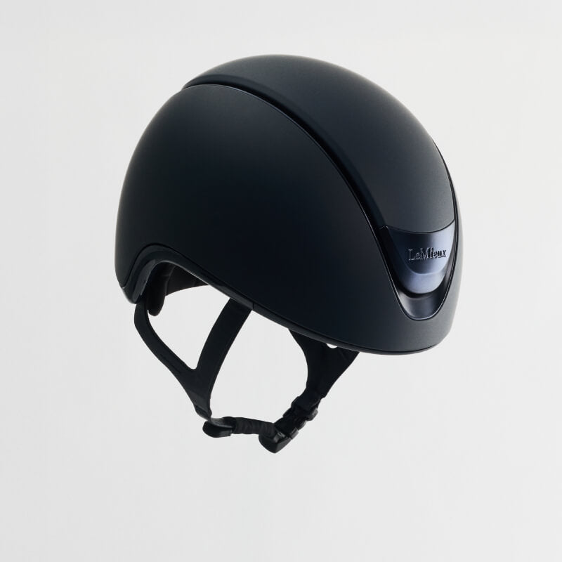 LeMieux Verv® Competition Helmet in matte navy with chin strap and adjustable fit.