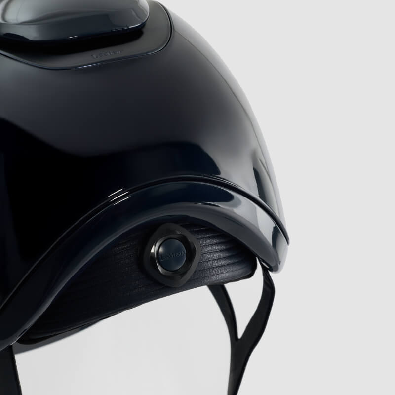 LeMieux Verv® Competition Helmet Gloss Navy with chin strap, designed for rider protection.