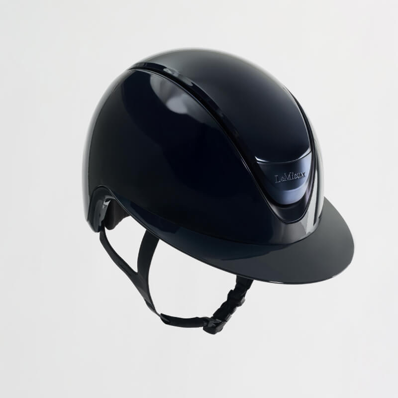 LeMieux Verv® Gloss Navy helmet with chin strap and enhanced rider protection.