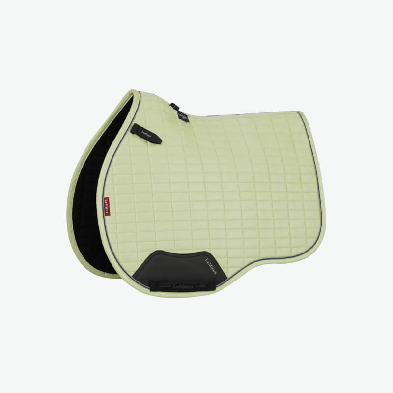 Light green LeMieux Suede GP Square Macaron with black corner patches on white.