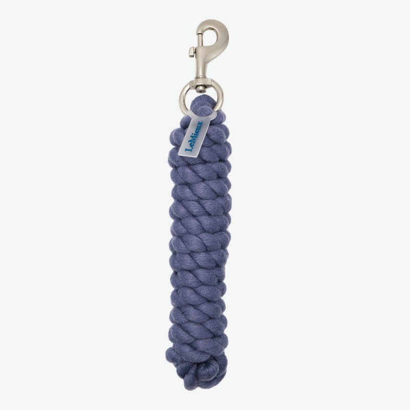LeMieux Polycotton Leadrope Shadow by LeMieux, coiled blue rope with metal clasp on white.