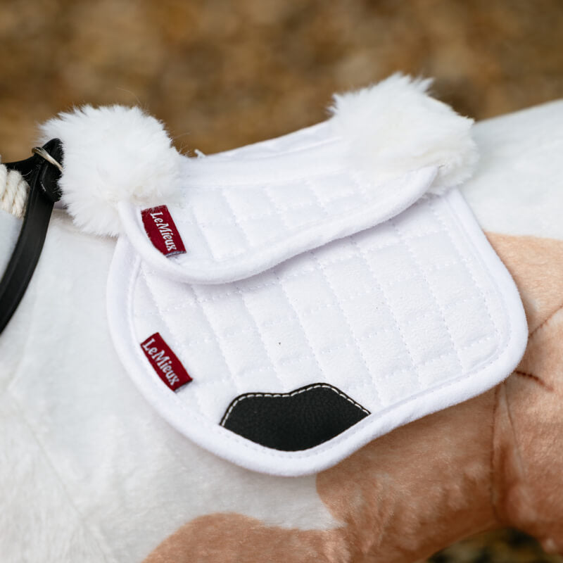 LeMieux Toy Pony Merino Half Pad White with fluffy corners on a model horse.