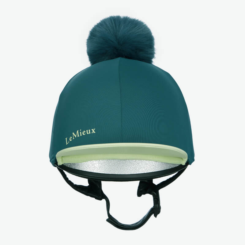 LeMieux Classique Pom Hat Silk Jungle with faux fur pom and side logo in teal.