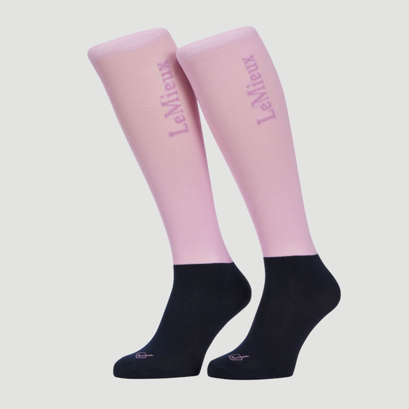 LeMieux Competition Socks Fondant 2pk: pink &amp; black riding socks with side text, plain background.