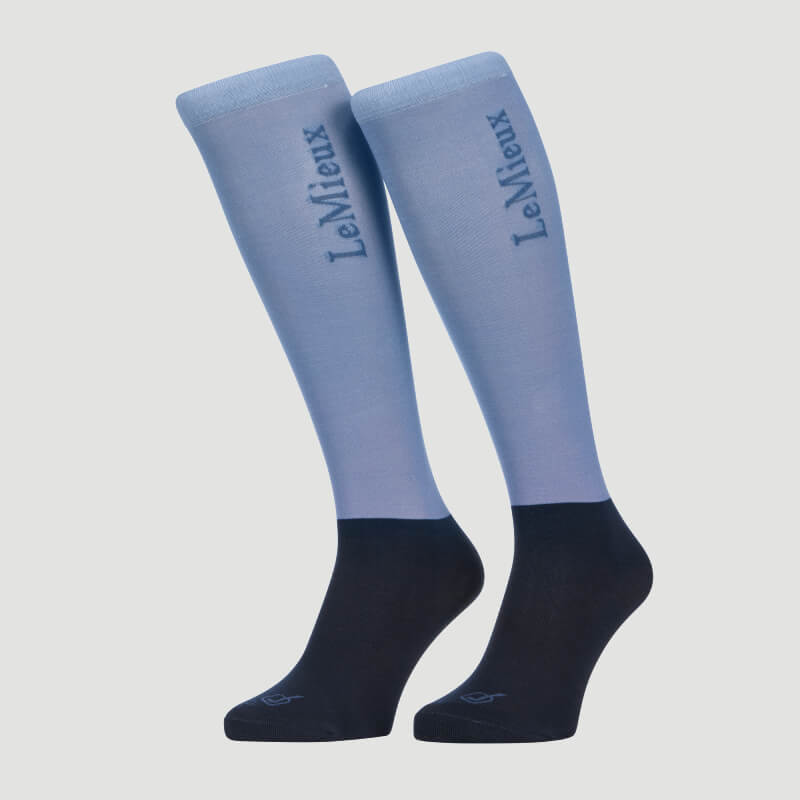 LeMieux Competition Socks Powder Blue 2pk: knee-high, light blue top, dark blue foot, branded.