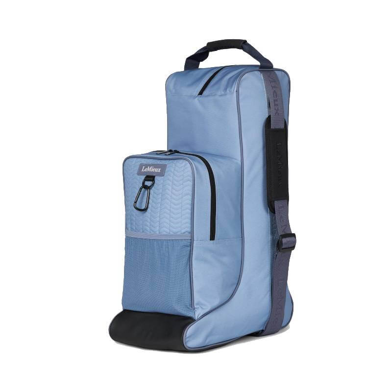 LeMieux Boot &amp; Hat Bag in Powder Blue with black base, zip pocket, handle, and strap.