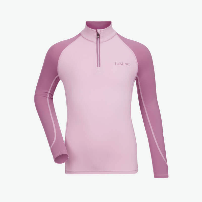 LeMieux Mini Baselayer Fondant: a kids’ riding top with UV50+ protection in light pink.