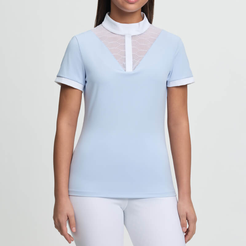Woman in a LeMieux Young Rider Eva Show Shirt Mist with white collar and mesh front detail.