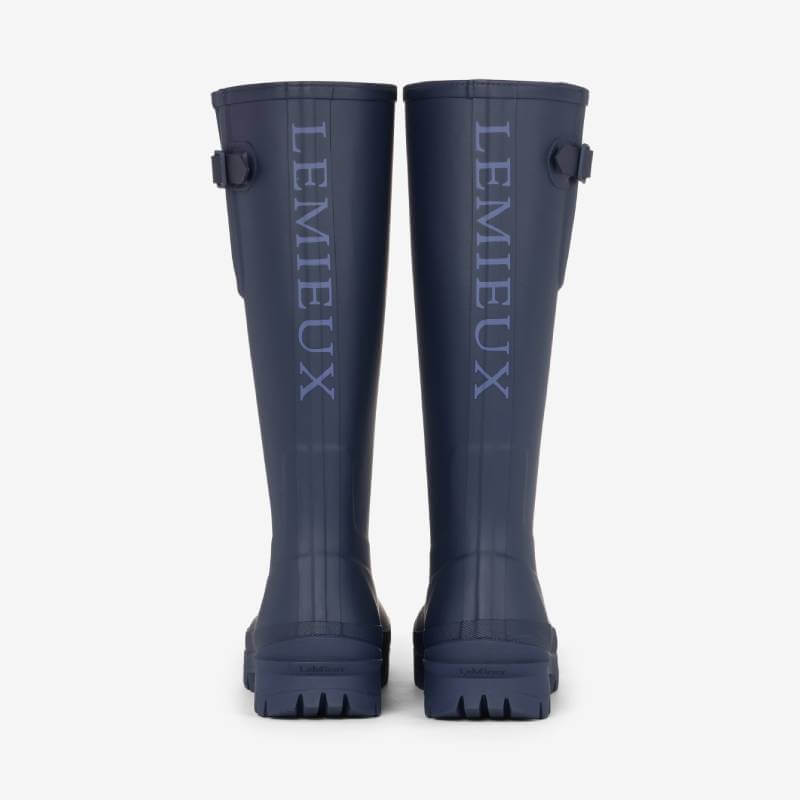 LeMieux Bramshaw Welly Navy with LeMieux branding vertically on the back of each boot.