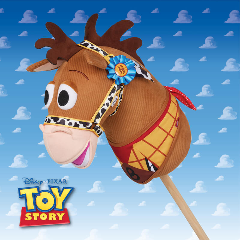 LeMieux Disney Hobby Horse Bullseye toy on a stick with a blue sky and clouds backdrop.