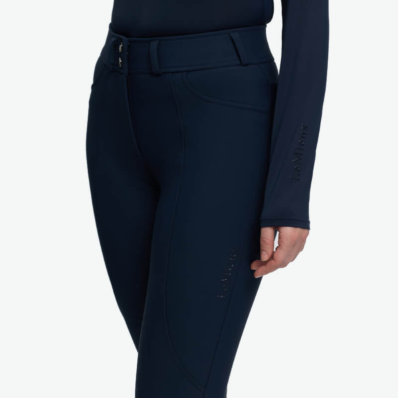 Wearing LeMieux Brilliance Full Seat Breeches in Navy, waist down.