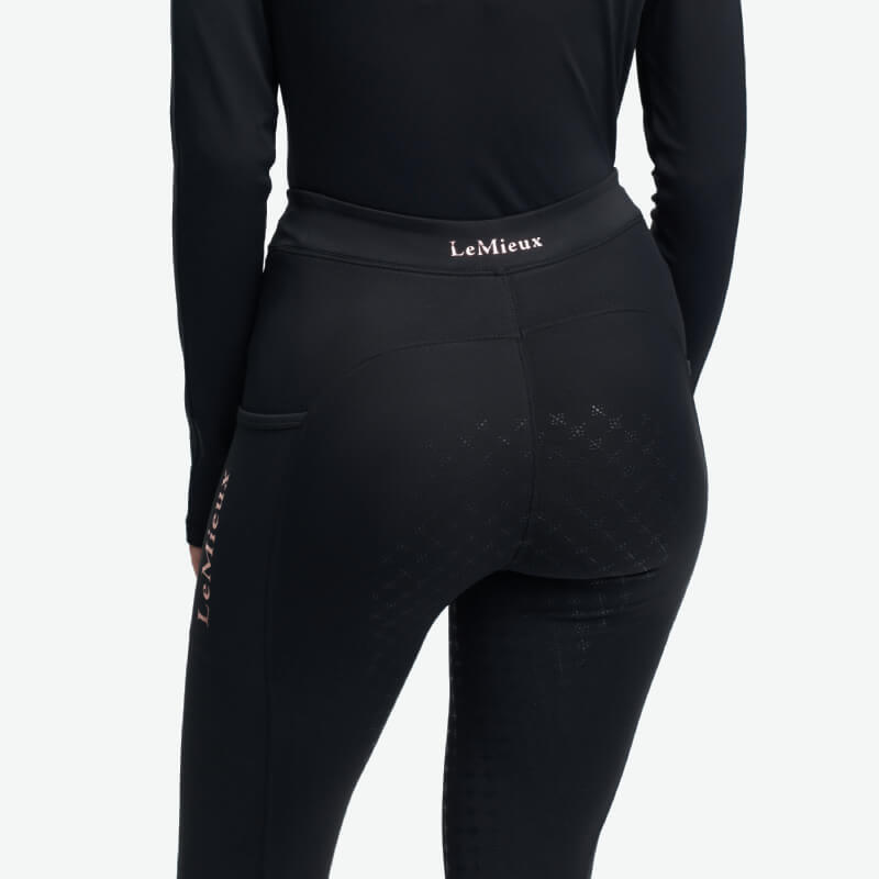 Young rider in black LeMieux Young Rider Sparkle Orla Pull On, logo visible on waistband.
