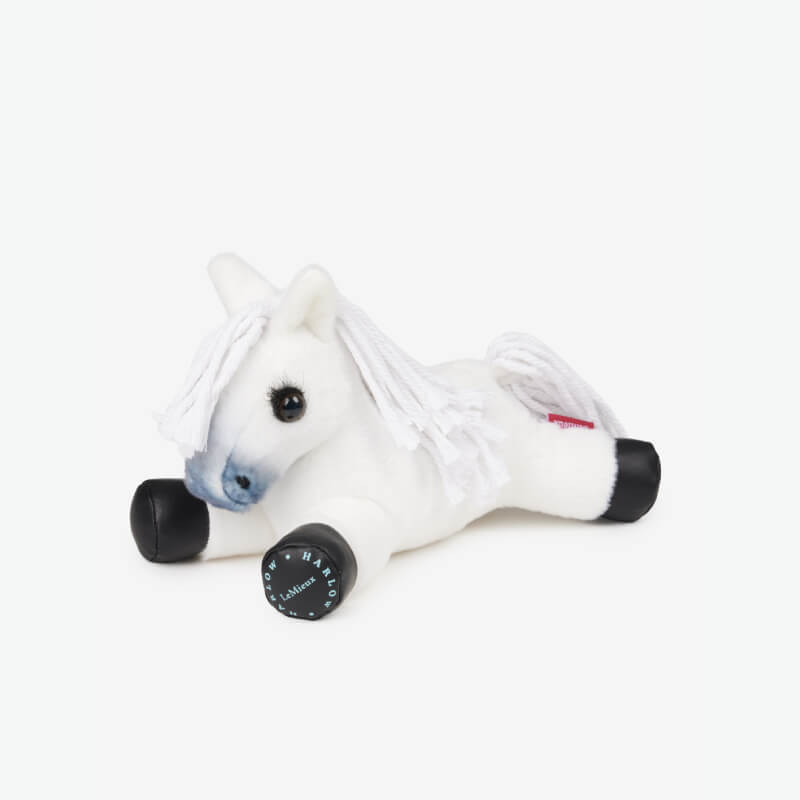 LeMieux Harlow Tiny Beanie Pony Panda: white plush horse with black hooves and blue eyes.