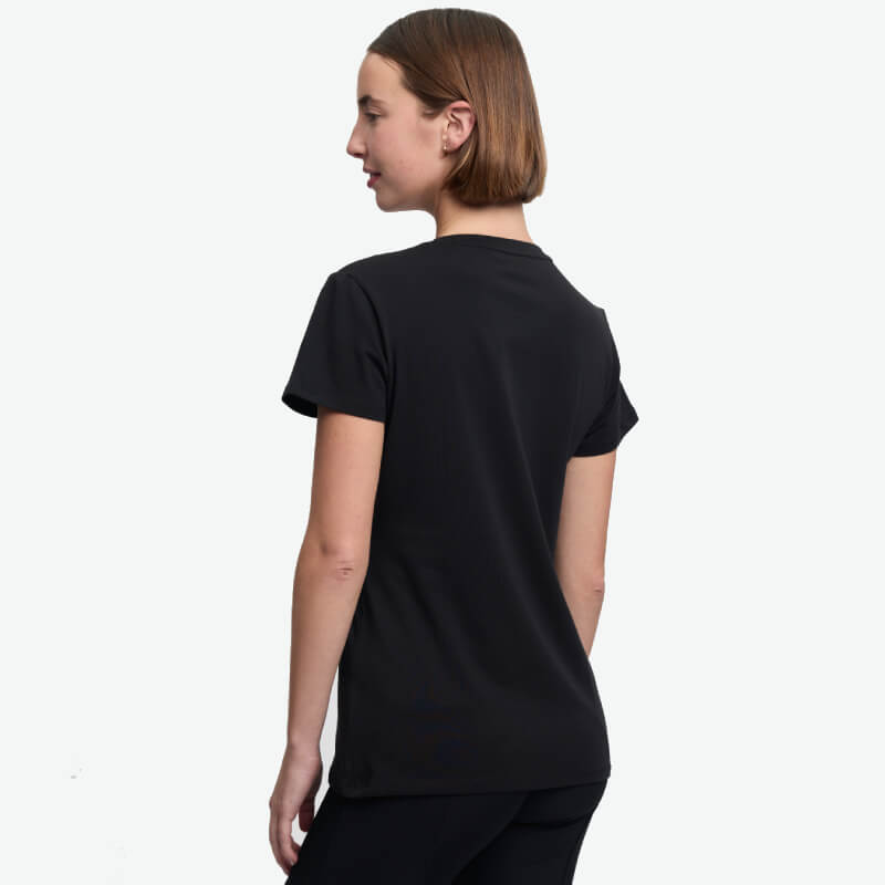 Woman with short brown hair seen from the back in a LeMieux Brilliance T-Shirt Black.