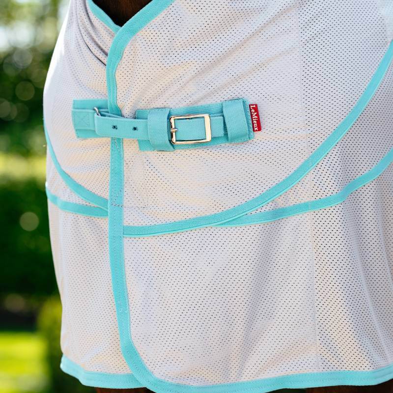 Close-up of the LeMieux Crystal Cooler Grey rug featuring mesh, turquoise trim, and silver buckle.