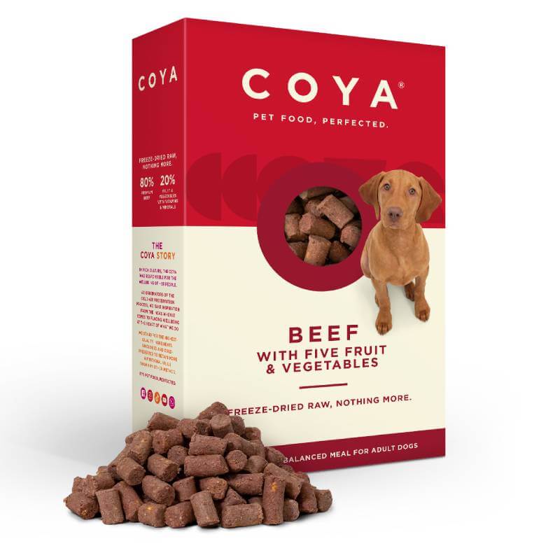 Coya Adult Dog Food Beef: Box with kibble in front and a brown dog pictured on the packaging.