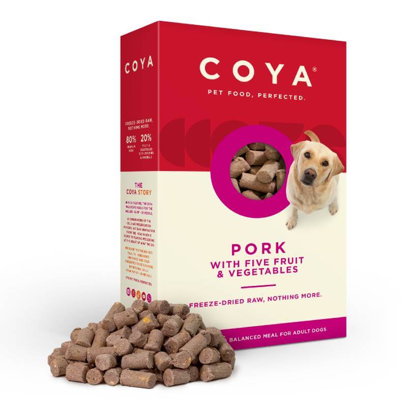 Coya Adult Dog Food Pork box with kibble pellets shown on complete and balanced packaging.