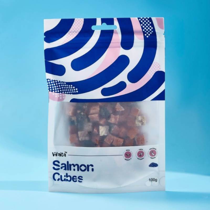 Waita Air Dried Salmon Cubes Dog &amp; Cat 100g pack shown against a blue background.