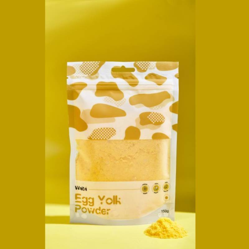 Waita Freeze Dried Chicken Egg Powder spilled in front, on yellow, 150g dog &amp; cat supplement.
