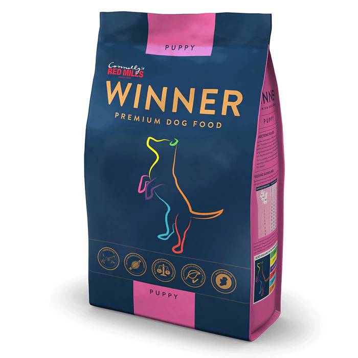 Red Mills Winner Puppy Premium Dog Food bag with colorful dog outline on the front.