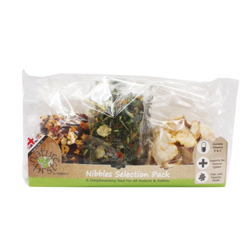 Clear bag of treats with Happy Pet Nature First Ball Hanger for small animal toys.