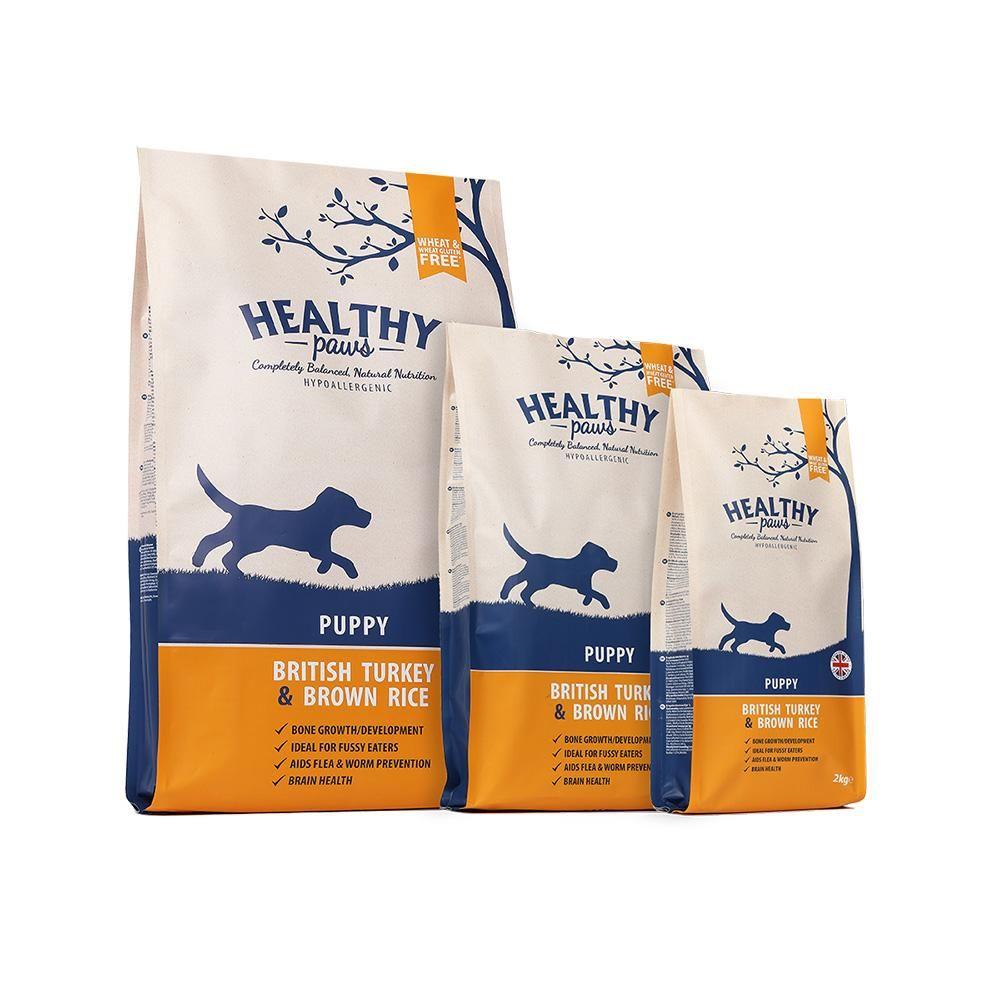 Three sizes of Healthy Paws Turkey &amp; Brown Rice Puppy Dry Food by Healthy Paws.
