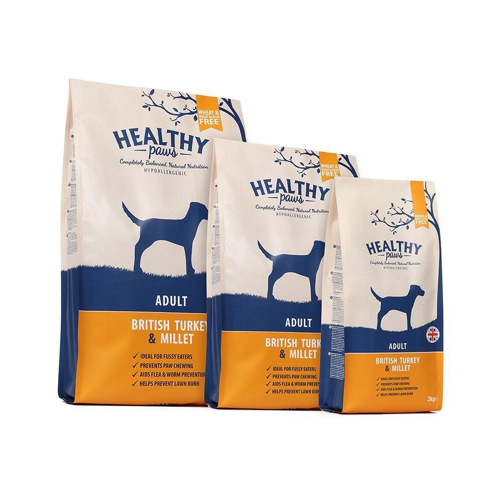 Three bags of Healthy Paws Turkey &amp; Millet Adult Dry Food in assorted sizes.