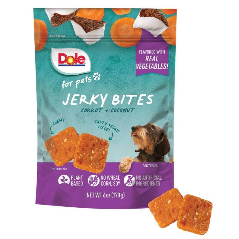 Dole Plant Based Jerky Carrot &amp; Coconut 170g—soft dog treat with a dog looking up.