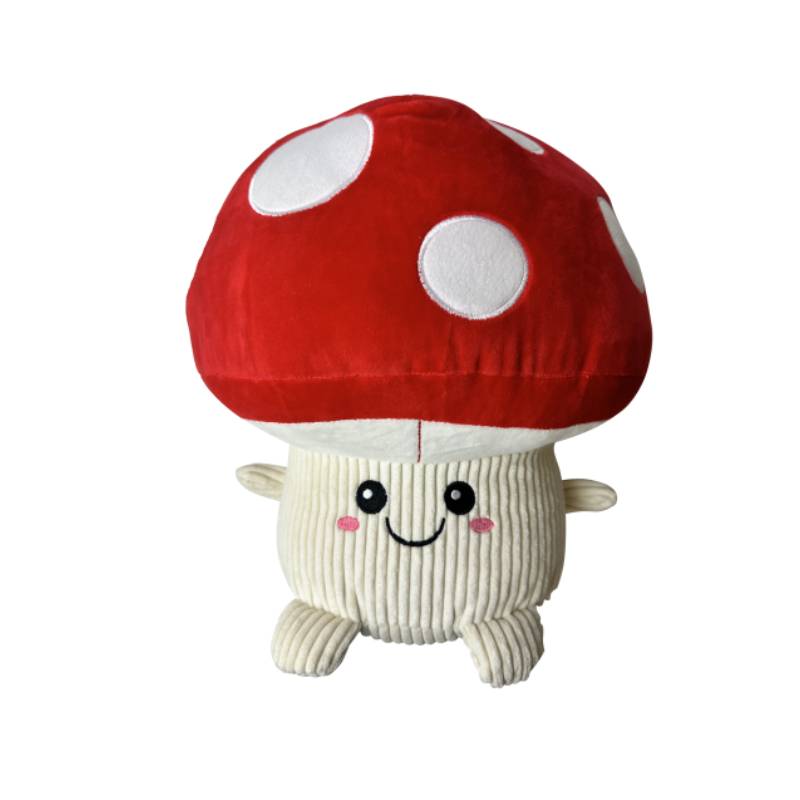 Happy Pet Jumbo Mushroom plush dog toy with a red cap, white spots, and a smiling face.