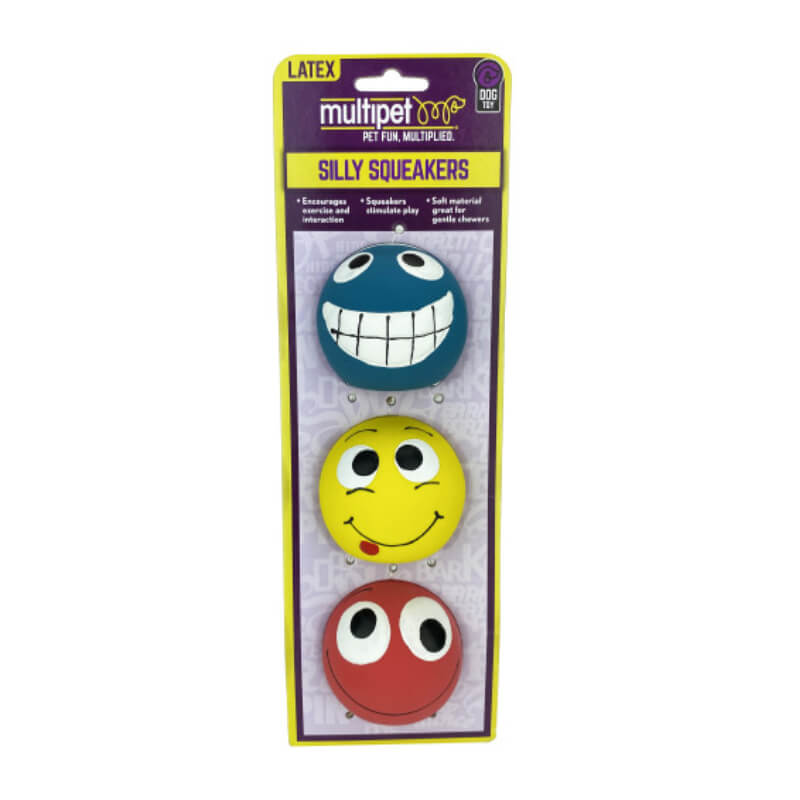 Three Happy Pet Silly Squeakers Peas Dog Toys with silly faces in plastic packaging.