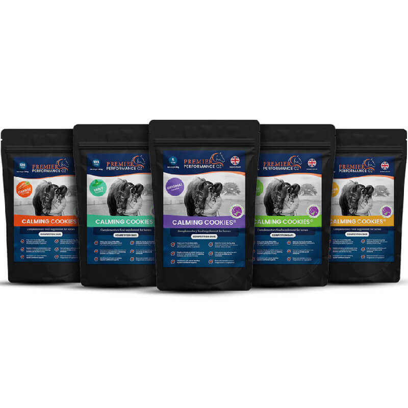 Five Premier Performance PP Calming Cookies bags, assorted flavors, for horse calming are displayed.