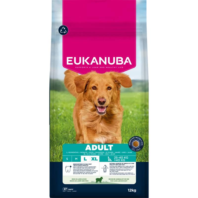 Eukanuba Lamb &amp; Rice Large Breed bag with a happy golden dog running on grass.