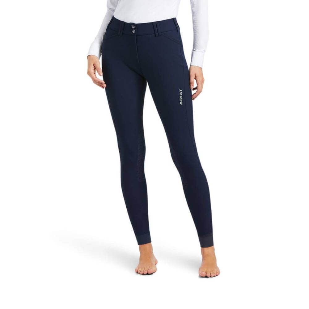 Person in Ariat Tri Factor Grip Knee Breeches by Ariat with silicone grip, standing barefoot.