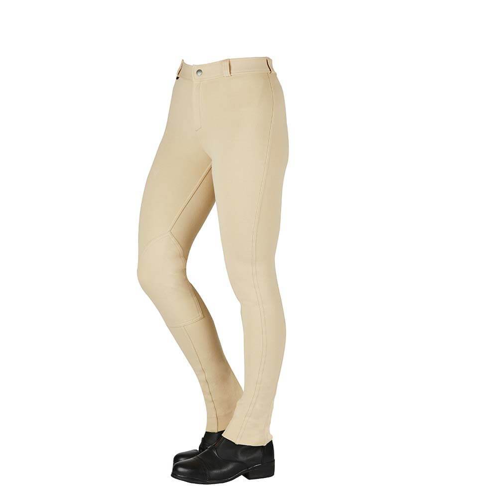 Saxon Warm Up Cotton Jodhpurs and black riding boots, shown waist down on a person.