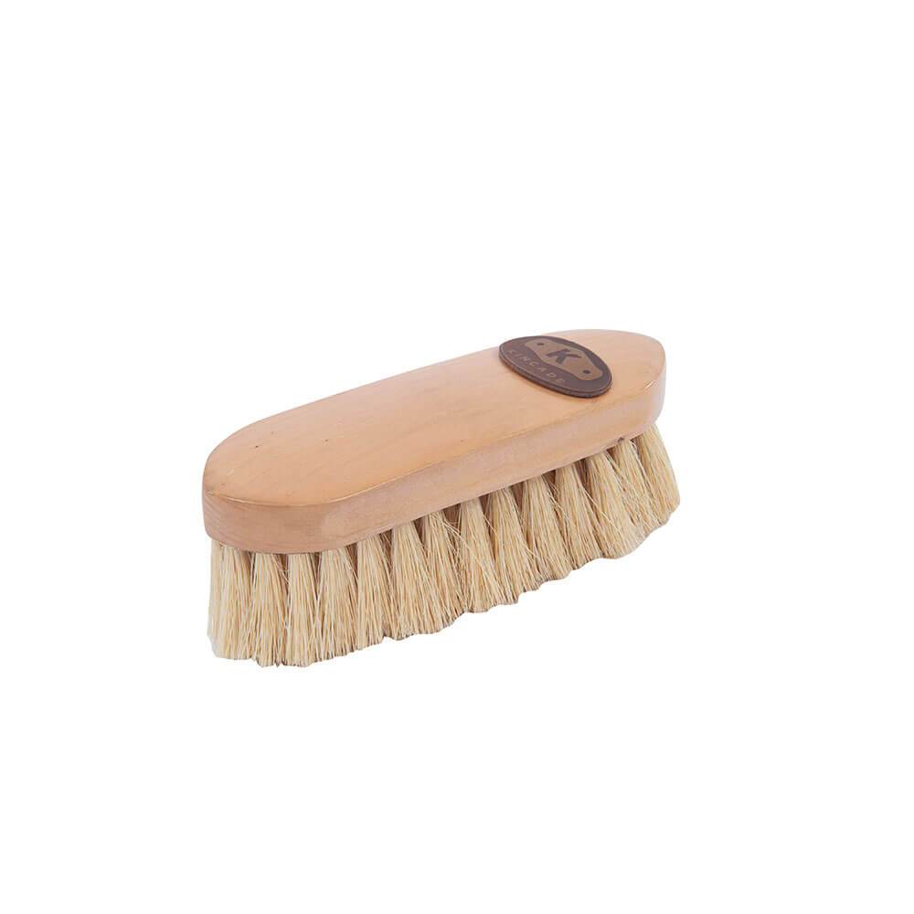 The Kincade Wooden Deluxe Dandy Brush Small features light bristles and an oval design for cleaning.