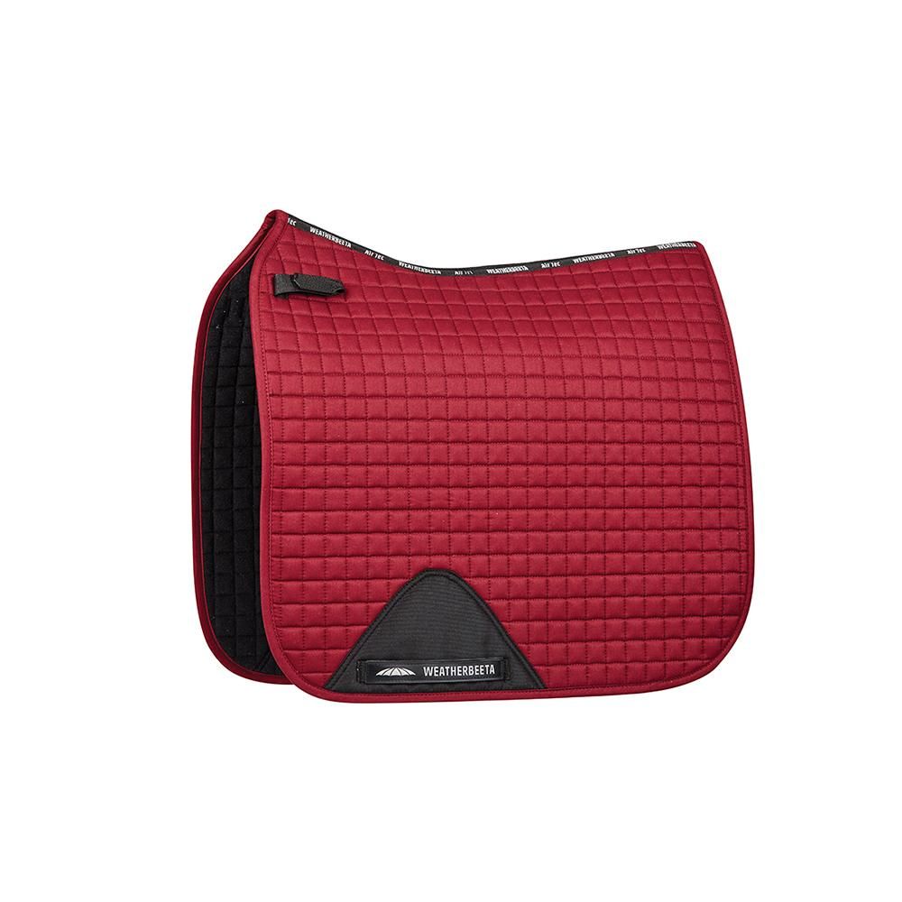 Red Weatherbeeta Prime Dressage Saddle Pad with black lining on a white background.