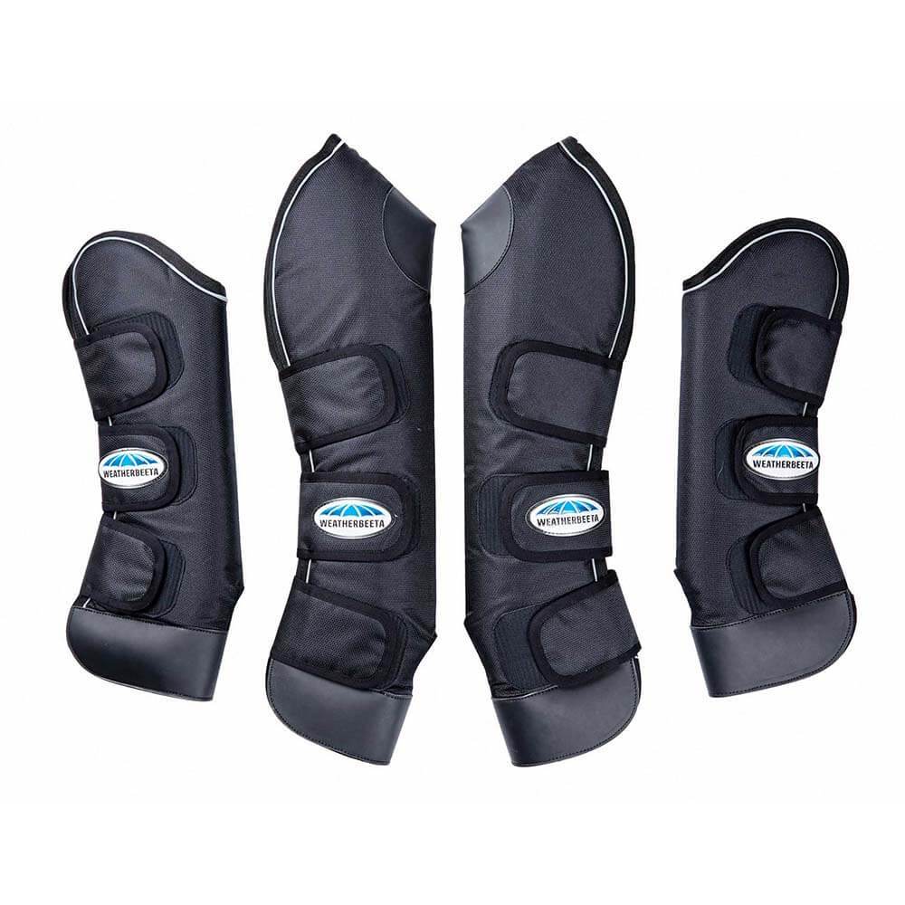 Four Weatherbeeta Deluxe Travel Boots, black with Velcro straps, displayed side by side.